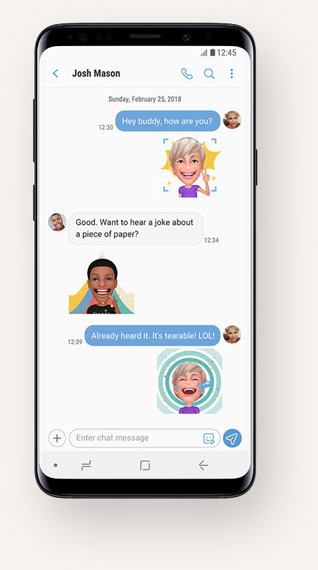 Galaxy S9+ with Messages app on-screen displaying a conversation with AR Emoji stickers